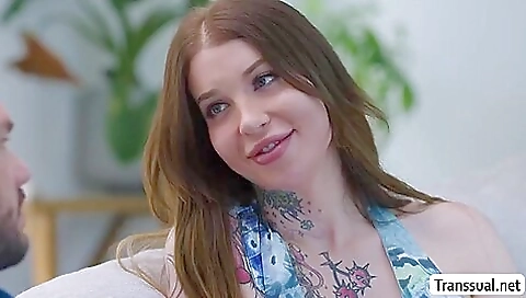 Busty shemale is fucked from behind by a big cock guy