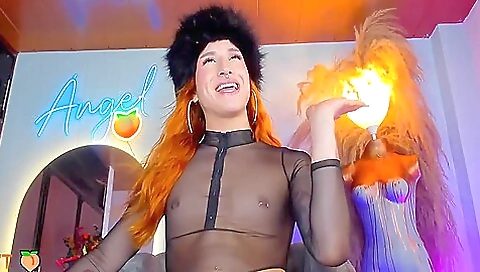 Hot redhead in a red bra shows her natural tits and pussy